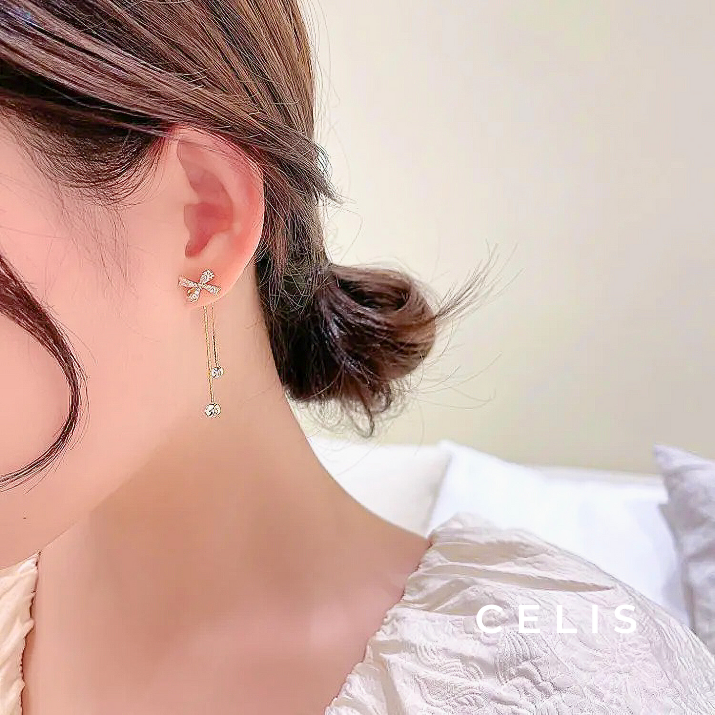 Ribbon Tassel Zirconia Earrings